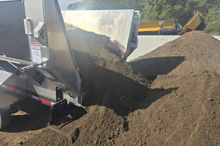 Unloading of compost