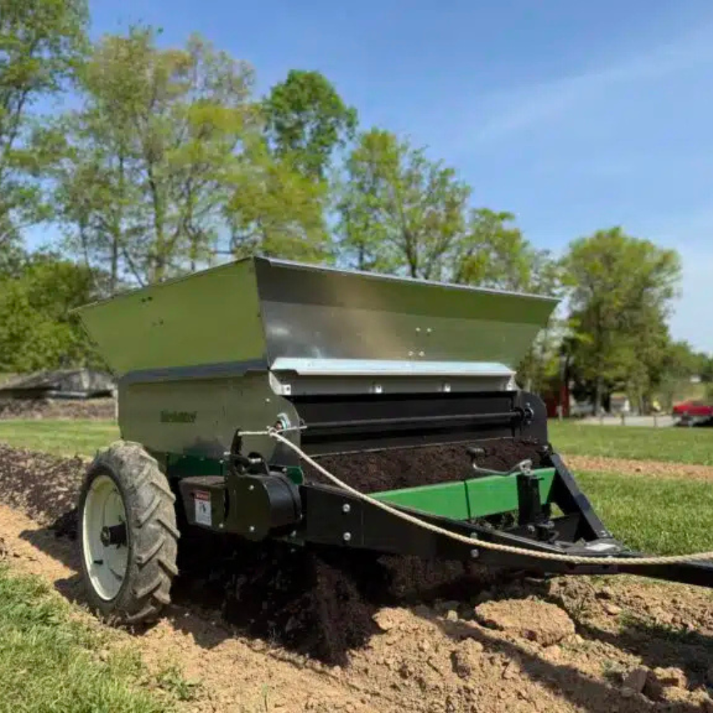 Adding compost to lawn