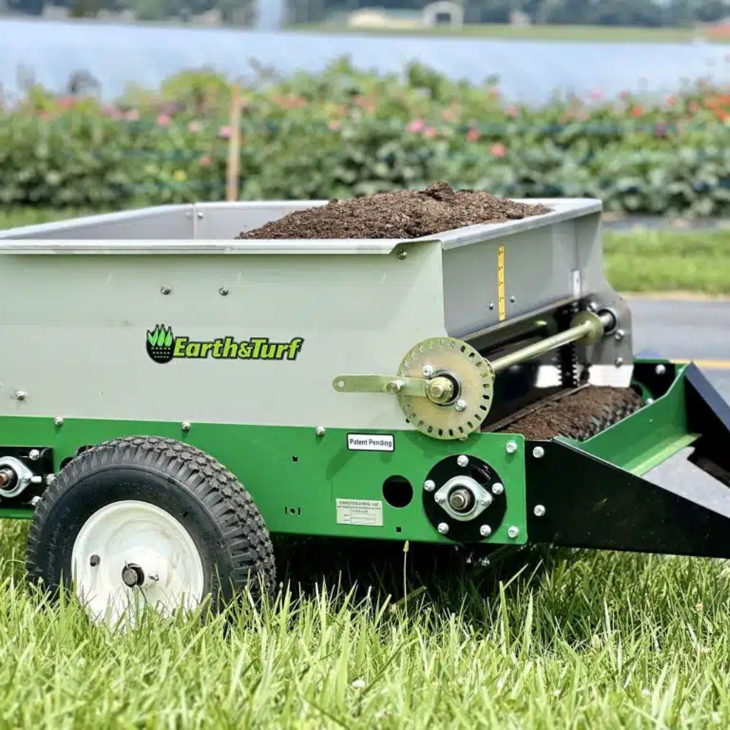 Adding compost to lawn