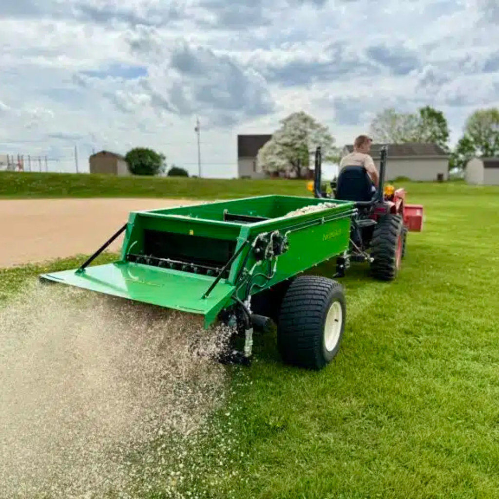 Adding compost to lawn