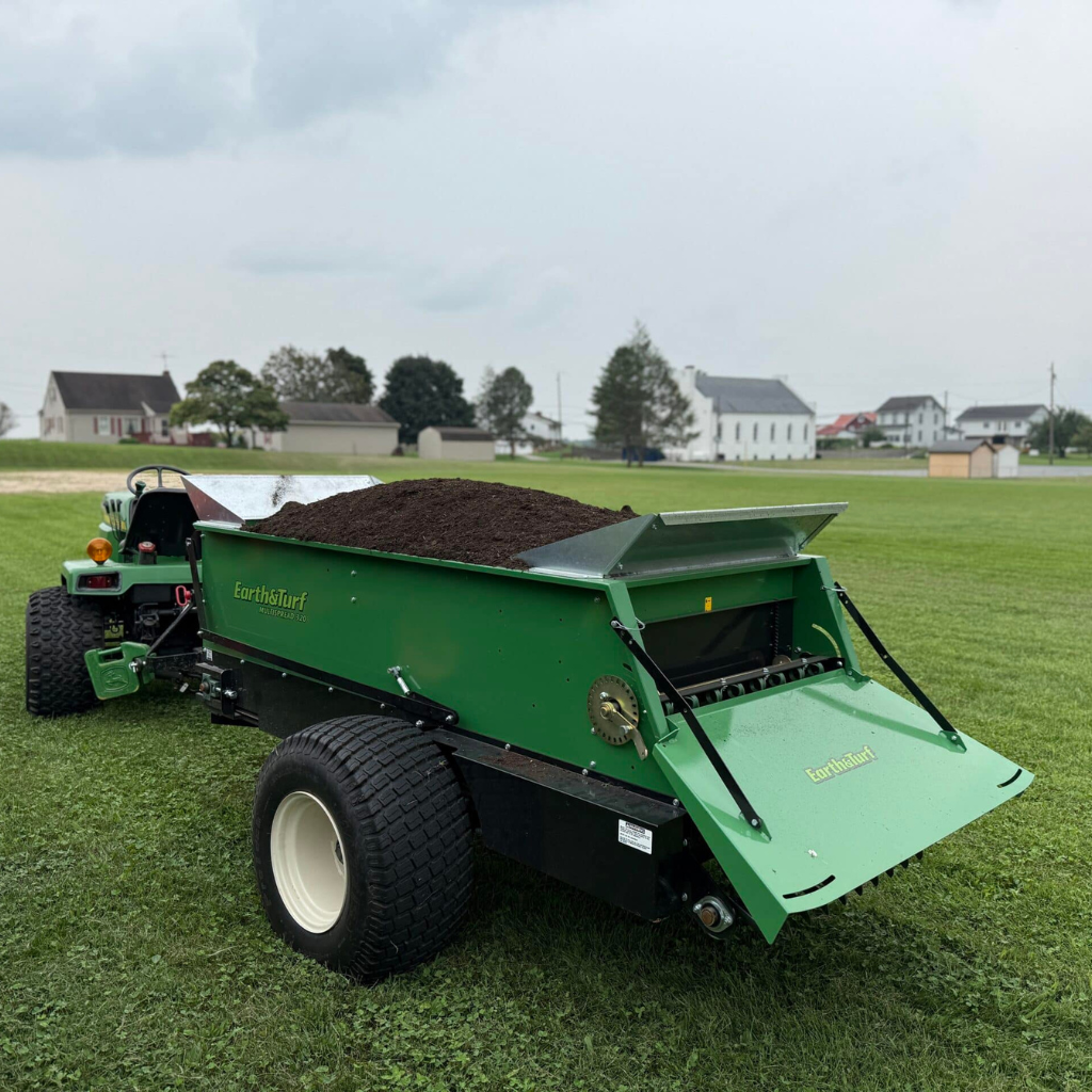 Adding compost to lawn